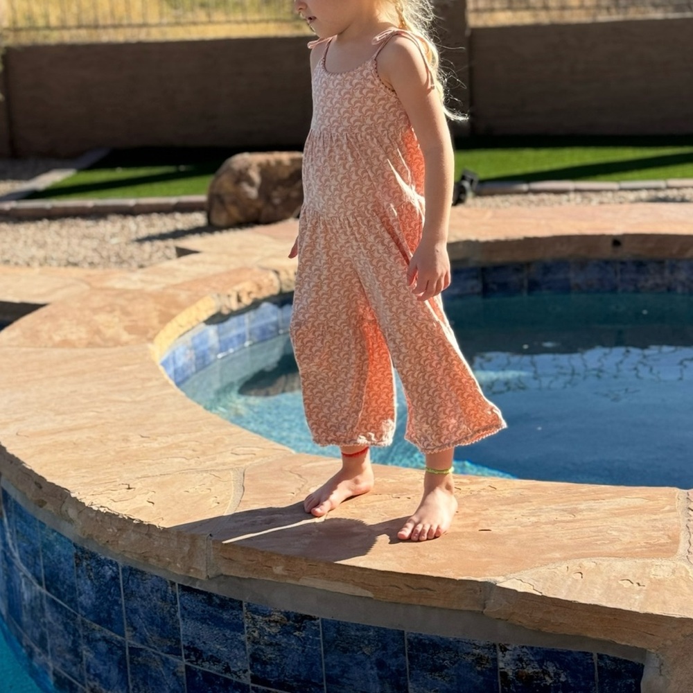 Kate Quinn spaghetti strap romper